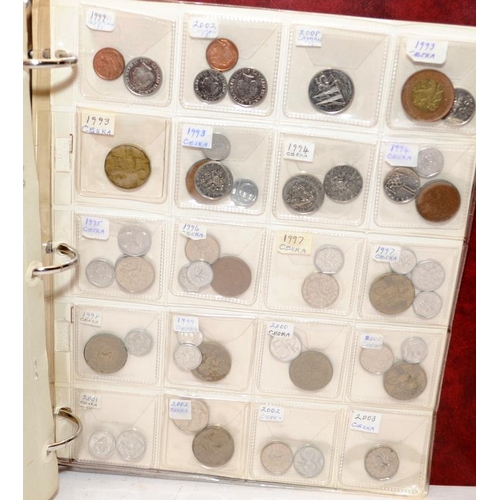 55 - Folder containing a large quantity of World coins. Alphabetically presented from Canada through to C... 