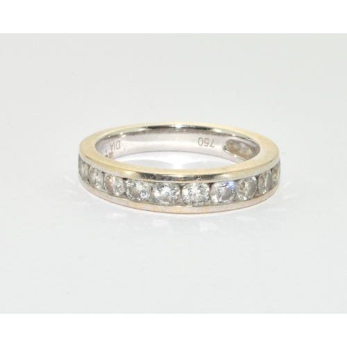 128 - An 18ct white gold and diamond half eternity ring, Size L, 4gm