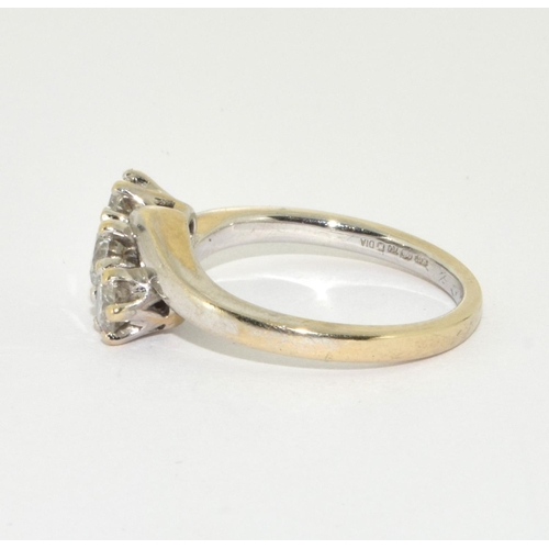 338 - An 18ct gold and diamond 3 stone ring Size L+, 4.6g