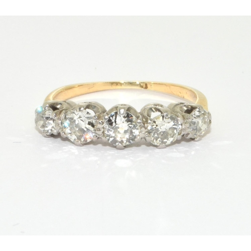 268 - A high grade gold and Diamond 5 stone ring approx. just over 1.00ct, Size O.