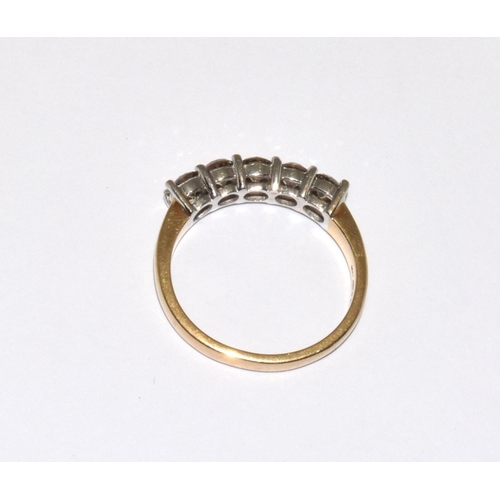 353 - A 9ct gold and 5 stone diamond ring Approx 1ct Size N