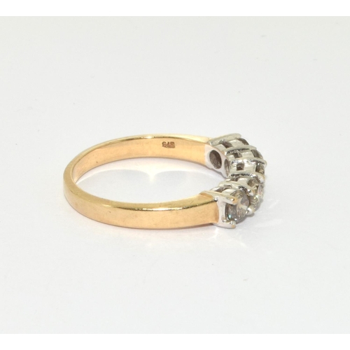 353 - A 9ct gold and 5 stone diamond ring Approx 1ct Size N