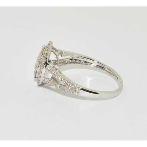 148 - An 18ct gold diamond heart ring Size M 1/2, approx 1ct.