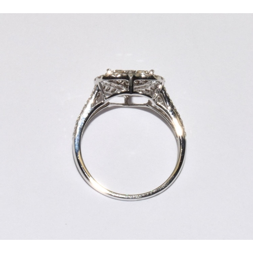 148 - An 18ct gold diamond heart ring Size M 1/2, approx 1ct.