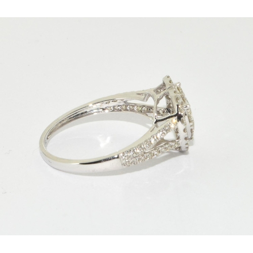 148 - An 18ct gold diamond heart ring Size M 1/2, approx 1ct.