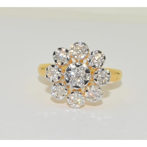 414 - An 18ct gold daisy ring, Approx 1.30ct, Size R