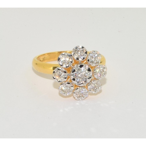 414 - An 18ct gold daisy ring, Approx 1.30ct, Size R