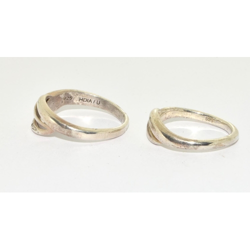 179 - Two silver and diamond rings, Size O & L