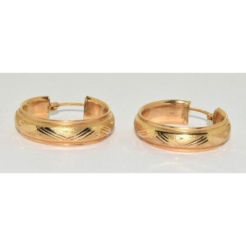 134 - 14ct gold earrings.