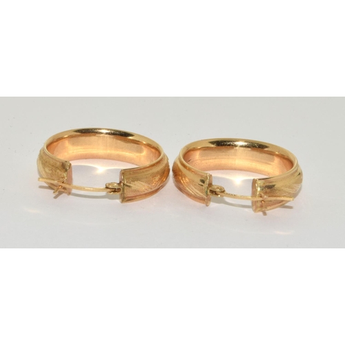 134 - 14ct gold earrings.