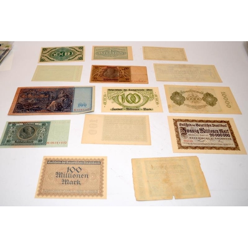 62 - A collection of vintage German banknotes to include high values. 14 notes in lot. Many in UNC condit... 