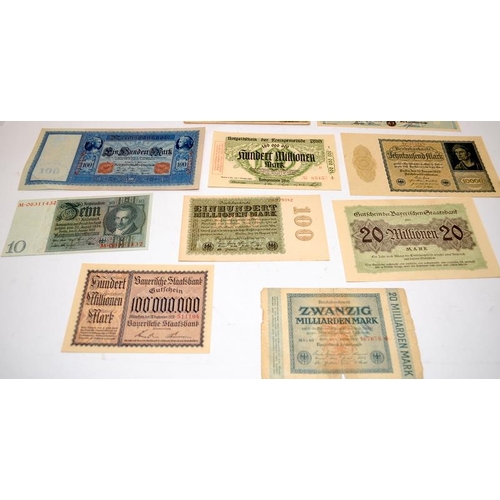 62 - A collection of vintage German banknotes to include high values. 14 notes in lot. Many in UNC condit... 