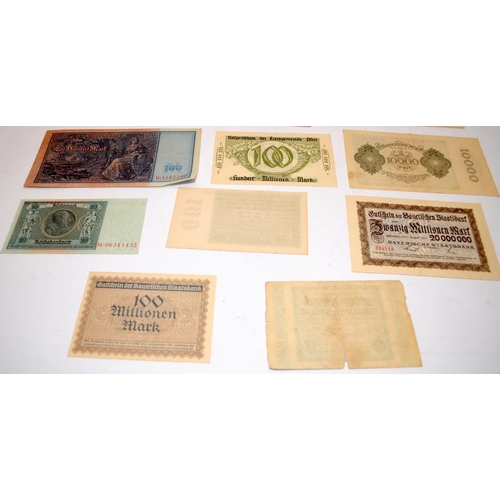 62 - A collection of vintage German banknotes to include high values. 14 notes in lot. Many in UNC condit... 