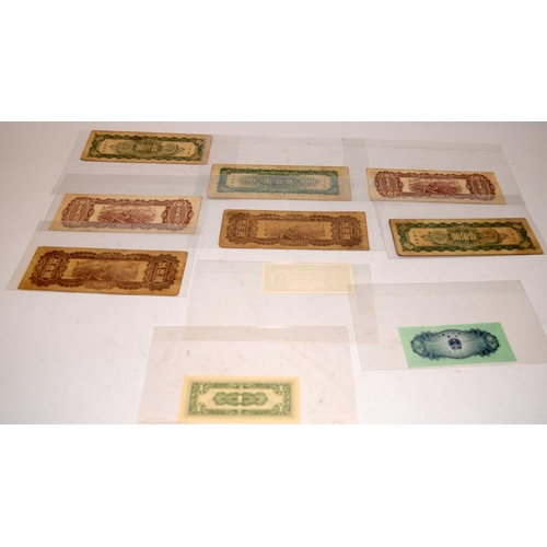 72 - A collection of vintage Asian banknotes to include examples from China and Mongolia. 18 in lot