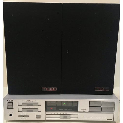 558 - STEREO AKAI AMPLIFIER AND MISSION SPEAKERS. The amplifier is AM-A201 and powers up fine along with a... 