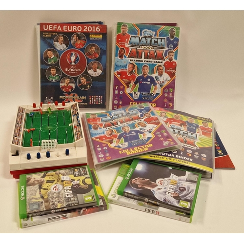 2 - Football interest lot to include several folders of trading cards, vintage Tomy game and four xbox g... 