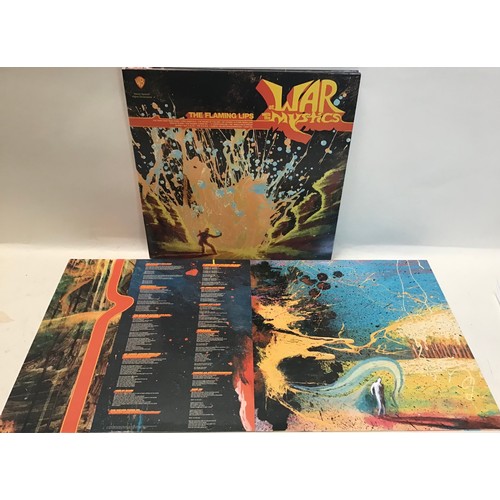 430 - THE FLAMING LIPS 2 LP ‘AT WAR WITH THE MYSTICS’. This is a 2006 release double LP 1st pressing on Wa... 