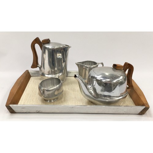 27 - Picquot Ware four piece mid century century tea set with tray.