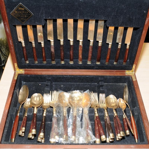 100 - Wooden canteen containing gold plated set of cutlery with wooden handles for six settings