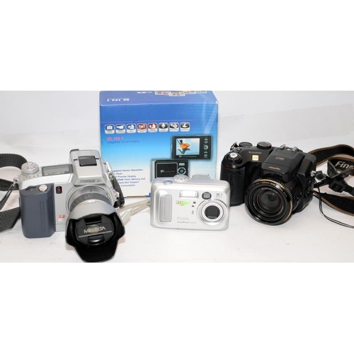 102 - Small collection of digital cameras to include a Fuji Finepix S7000. On behalf of Age Concern