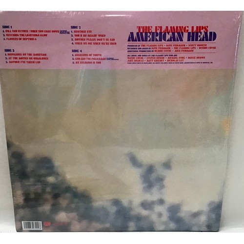 22 - FLAMING LIPS ‘AMERICAN HEAD’ DOUBLE VINYL ALBUM. 2 x LP’s on 180G Special Edition Tri-Colour Vinyl. ... 