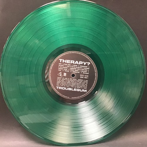 133 - SIGNED THERAPY ‘TROUBLEGUM’ VINYL ALBUM. Signed on 21-2-94 on a limited edition Green Vinyl LP Album... 