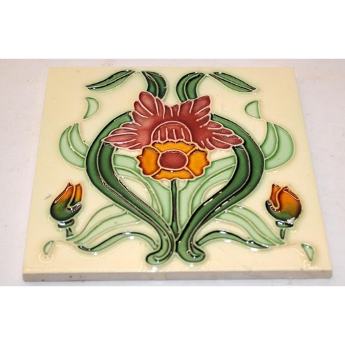 33 - 10 x tubeline ceramic tiles in an Art Deco style on an ivory ground. All the same design