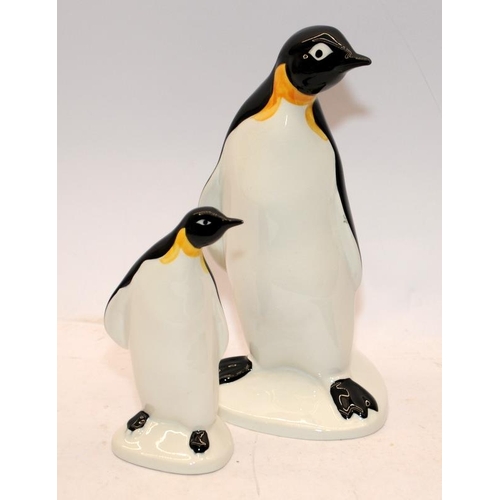 38 - Large and small hand painted Poole Pottery penguins. Largest is 23cms tall.