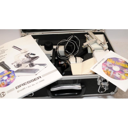 62 - Bresser Scientific Microscope c/w accessories in an impact resistant case. Model ref: 51-10000