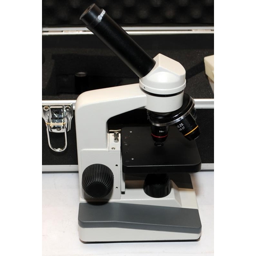 62 - Bresser Scientific Microscope c/w accessories in an impact resistant case. Model ref: 51-10000