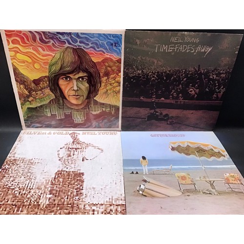 390 - NEIL YOUNG VINYL LP RECORDS X 4. Titles here are as follows - On The Beach (with original inner slee... 