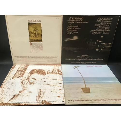 390 - NEIL YOUNG VINYL LP RECORDS X 4. Titles here are as follows - On The Beach (with original inner slee... 