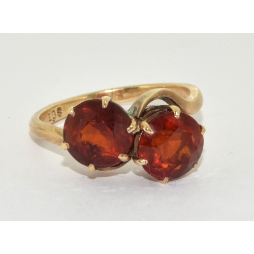 297 - 9ct Gold Double Twist Amber Ring. Size R