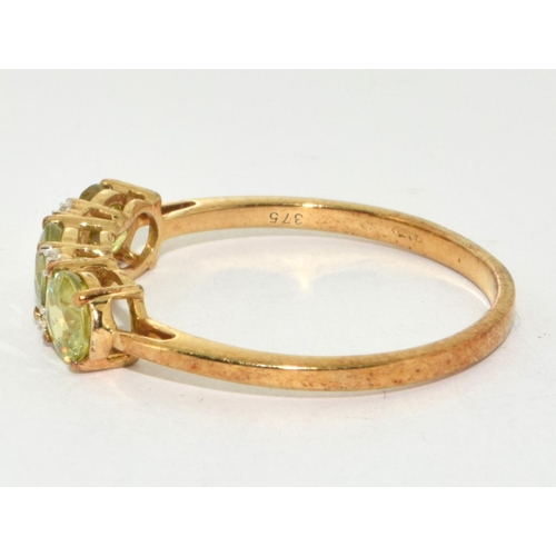 261 - 9ct Gold Ladies 3 Stone Peridot and Diamond  Ring. Size R