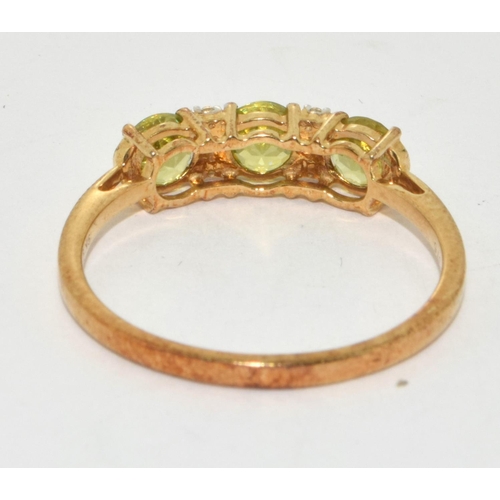 261 - 9ct Gold Ladies 3 Stone Peridot and Diamond  Ring. Size R