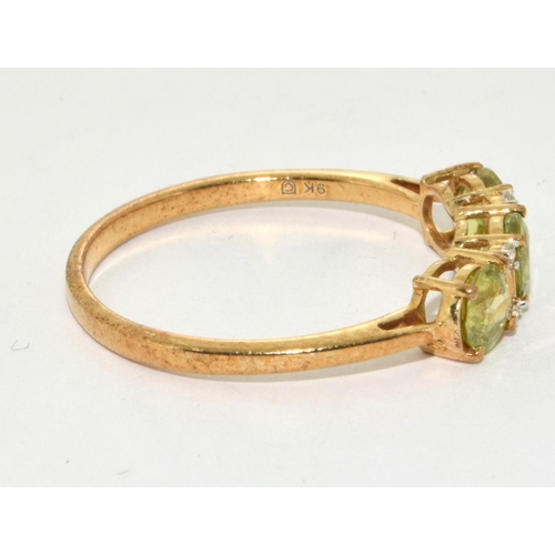 261 - 9ct Gold Ladies 3 Stone Peridot and Diamond  Ring. Size R