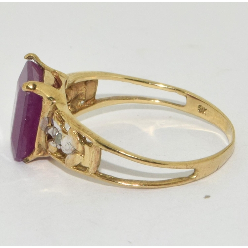 330 - 9ct Gold Diamond & Ruby Ring. Size O