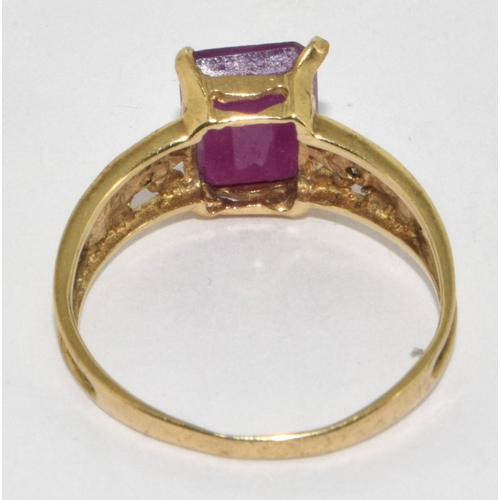 330 - 9ct Gold Diamond & Ruby Ring. Size O