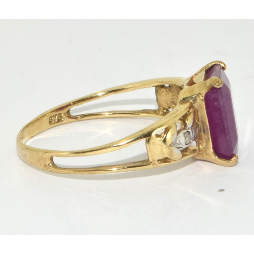 330 - 9ct Gold Diamond & Ruby Ring. Size O