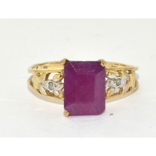 330 - 9ct Gold Diamond & Ruby Ring. Size O