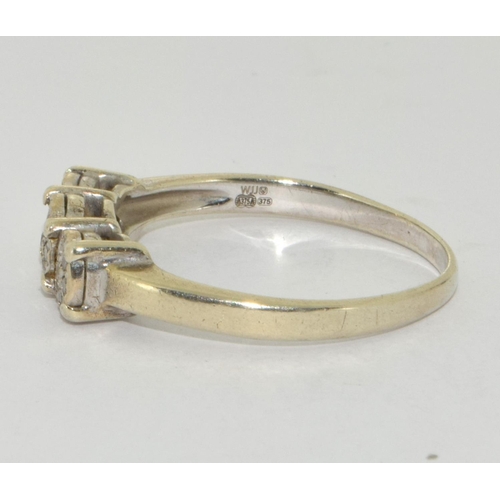 265 - 9ct White Gold Diamond Trilogy H/M 0.15.ct Size U