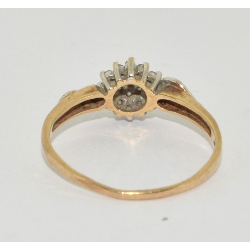 307 - 9ct Gold Diamond Cluster Ring. 15 pts Size O