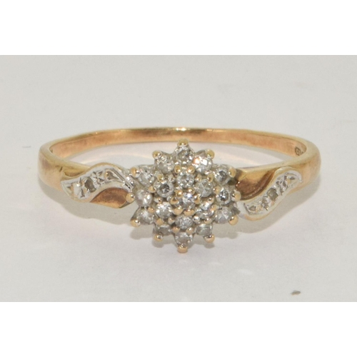 307 - 9ct Gold Diamond Cluster Ring. 15 pts Size O