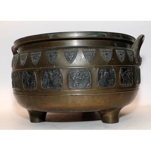 61 - Large 19thC Oriental bronze bowl on three feet with pictorial panel decoration. 37cms across