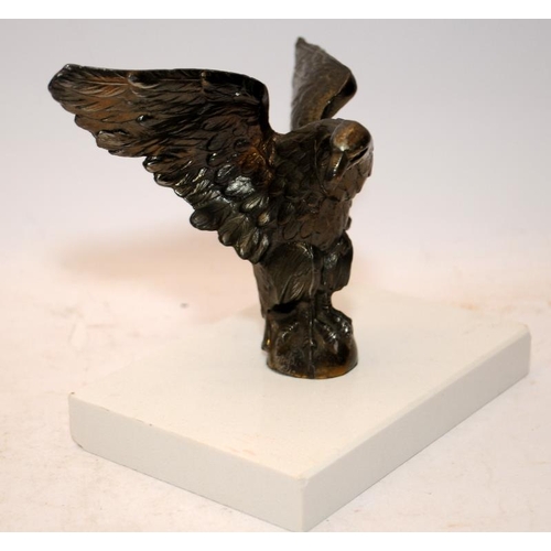 81 - Vintage cast metal eagle mounted on a marble base. 12cms tall