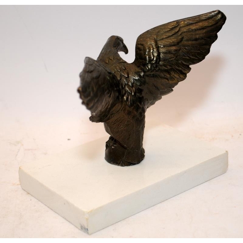 81 - Vintage cast metal eagle mounted on a marble base. 12cms tall