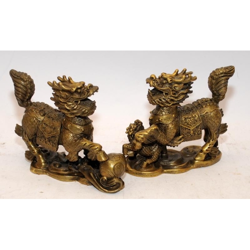 85 - Pair of vintage Chinese bronze Chi Lin or Dragon Horses, male and female representations. 11cms tall