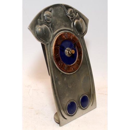 86 - Art Nouveau free standing clock in pewter with a copper chapter ring in the style of Archibald Knox.... 