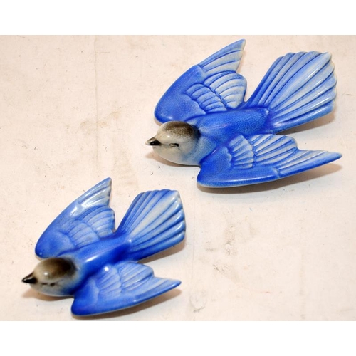 94 - Two vintage Poole Pottery bluebird wall plaques in excellent original condition. The largest is 12.5... 