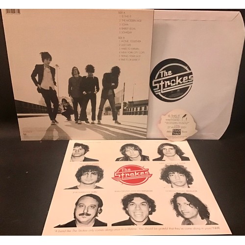 364 - THE STROKES ‘IS THIS IT’ VINYL LP WITH RARE INSERT. Ex condition copy of this 2001 debut album on Ro... 